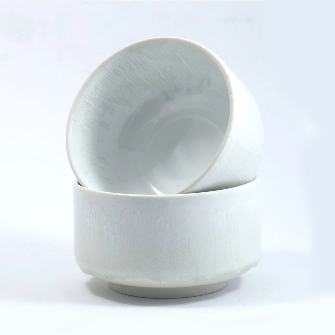 Munch Bowl Sea Foam - By Studio Arhoj keramikkbolle i lysegrønn nyanse med bred, stødig fot og tidløst design