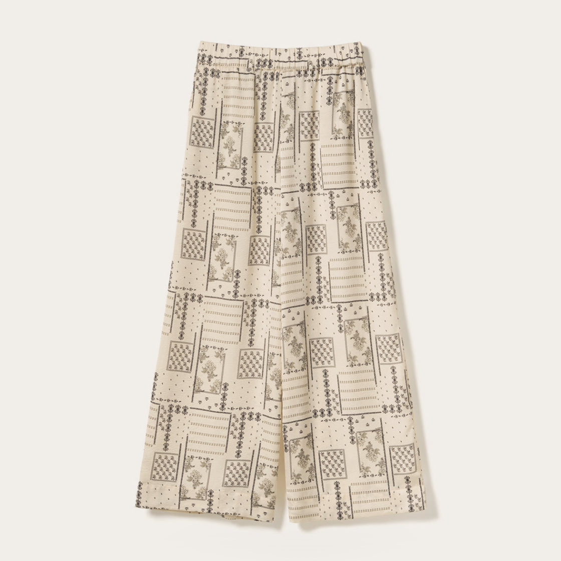 Bukser Kameron Dolly Ivory Print - By Noella med løstsittende design og elastisk midje i mønstret kremfarget stoff