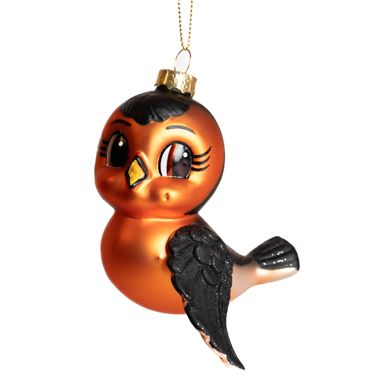 Dompap julekule fra HEIM Studio – håndmalt glassfigur i rød og svart med store øyne og vipper. Nostalgisk og sjarmerende julefugl.